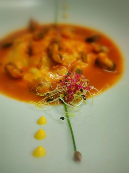 RAVIOLI WITH FISH SERVED WITH SOUTE' MUSSELS